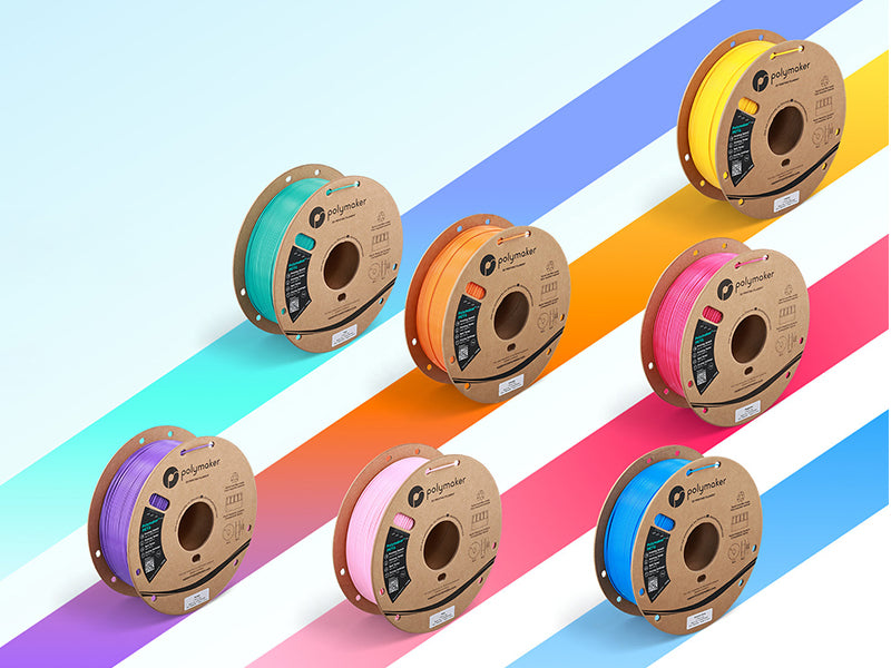 PETG filament spools displayed in multiple colors