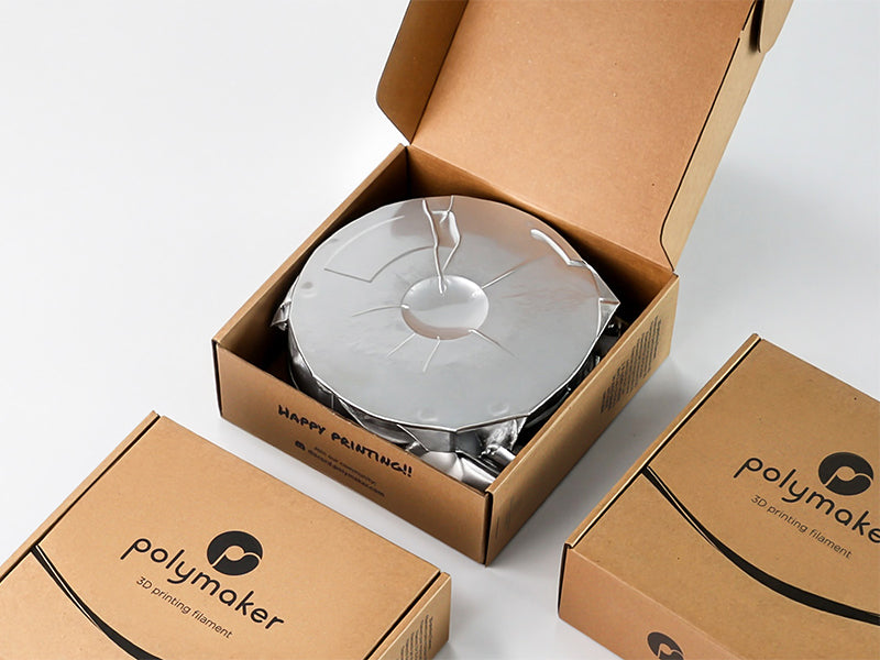 PETG filament spool inside protective retail packaging